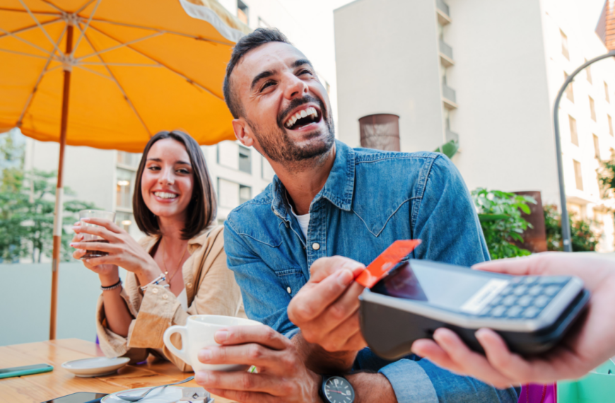 couple out to lunch spending money happy credit card coffee