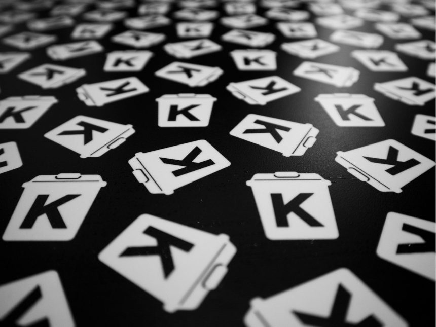 Many objects with the letter "k" are scattered; k-shaped economy